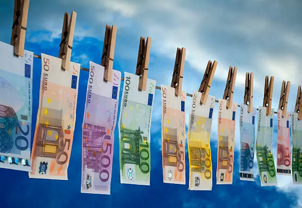 geld in wasmachine verkleurd
